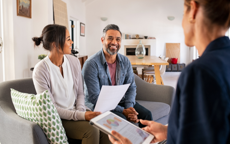 couple speaking with a retirement income planner