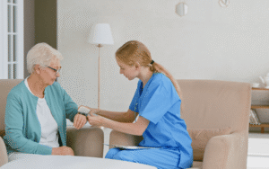 woman receiving home health care from nurse. This is because she has long-term care in San Diego.