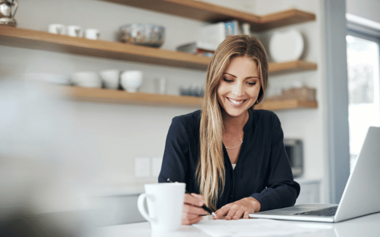 woman sitting at her desk with her laptop planning how to finance her long-term care